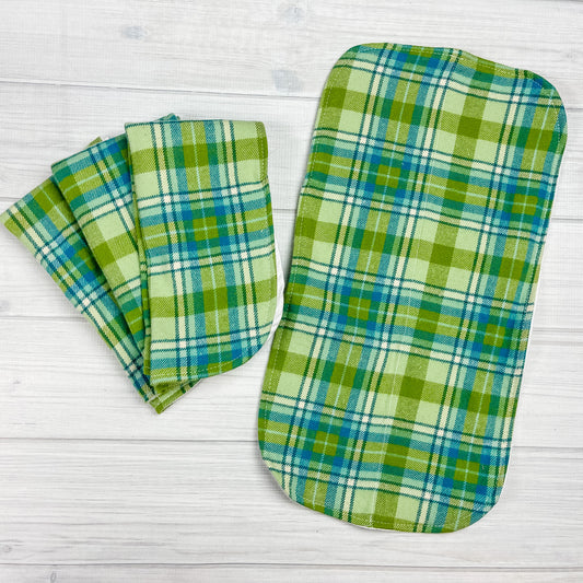 plaid flnnel burp cloths in shades of green and blue. 
